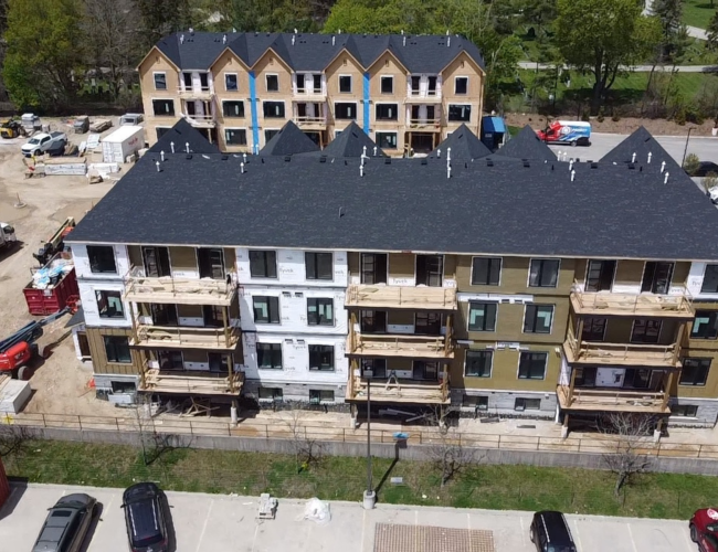 Block D rear balcony and window installation underwayF.